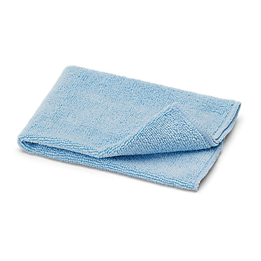 Das Nölle Profi Brush Microfaser-Allzwecktuch, 35x30 cm in Blau (1 Stück) von Nölle Profi Brush Bürsten- & Pinseltechnik e.K., liegt ordentlich gefaltet auf weißem Hintergrund-ideal für streifenfreie Reinigung aller Oberflächen.