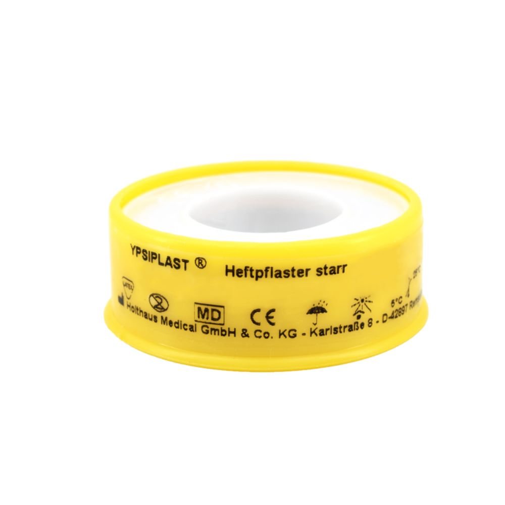 Το αυτοκόλλητο επίθεμα Holthaus Ypsiplast®, άκαμπτο, της Holthaus Medical GmbH & Co. KG, είναι μια ιατρική ταινία με κίτρινο πλαστικό περίβλημα και τυπωμένα κείμενα και σύμβολα, που προορίζεται για την αποτελεσματική περιποίηση πληγών, διαθέτει υψηλή συγκολλητική δύναμη και είναι κατάλληλο για αξιόπιστη ιατρική χρήση.