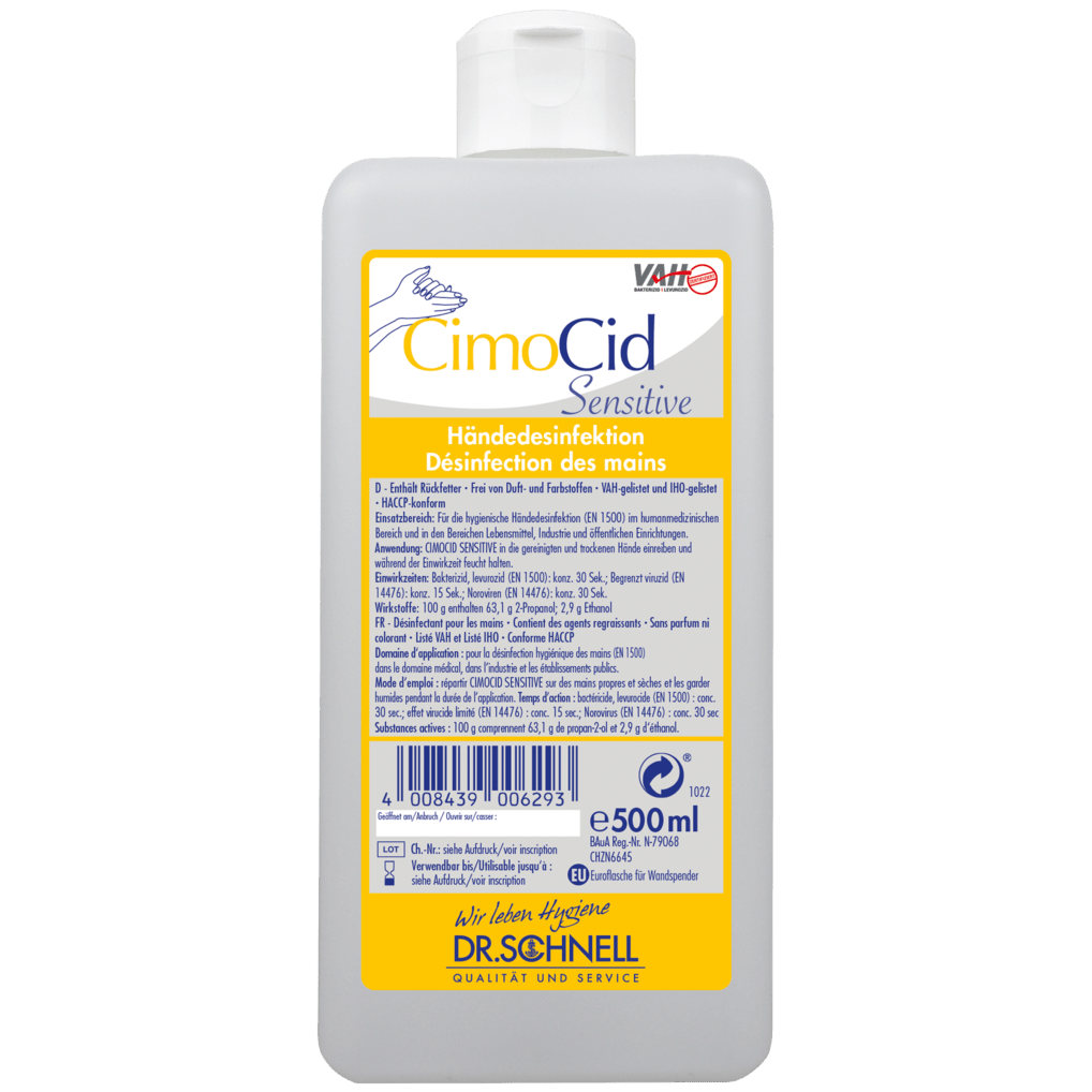 Ένα μπουκάλι 500 ml Dr. Schnell CIMOCID SENSITIVE απολύμανσης χεριών από την DR.SCHNELL GmbH & Co. KGaA, με κίτρινη-λευκή ετικέτα στη γερμανική και γαλλική γλώσσα με πληροφορίες προϊόντος, γραμμωτό κώδικα, λογότυπο μάρκας και ένδειξη για την απαλή αλλά αποτελεσματική μείωση μικροβίων.