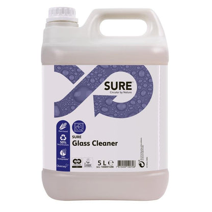 Ένα πλαστικό δοχείο 5 λίτρων με SURE Glass Cleaner από την Diversey Deutschland GmbH & Co. OHG με λαβή μεταφοράς και βιδωτό καπάκι. Η μοβ ετικέτα δείχνει σύμβολα, πληροφορίες προϊόντος, καθαριστική δύναμη, ανακυκλωσιμότητα και φιλικότητα προς το περιβάλλον.
