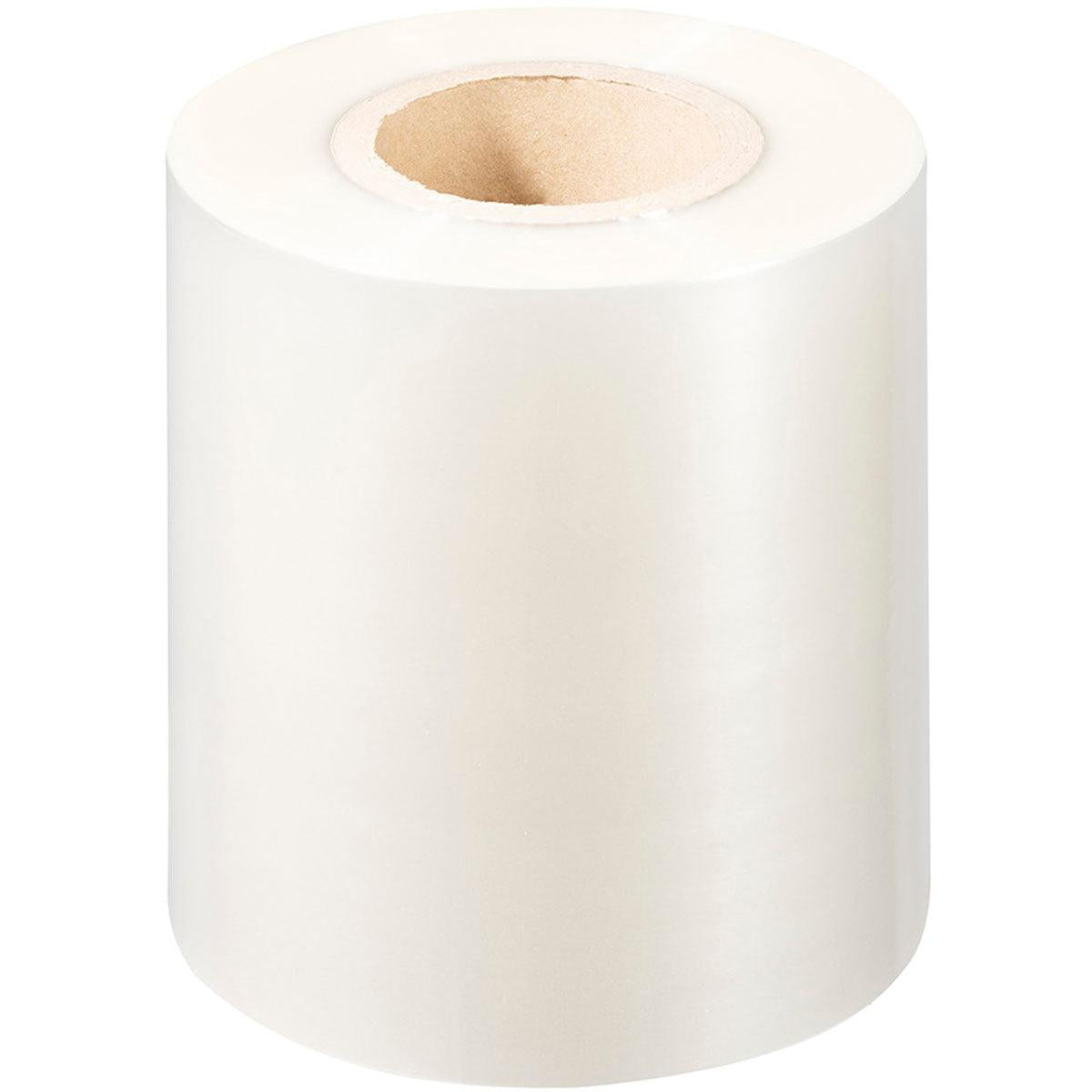 Eine große Rolle Duni GmbH PP-Siegelfolie Antifog mit Pappkern, aufrecht stehend auf weißem Hintergrund - perfekt für Antifog- und Lebensmittelverpackungsanwendungen.