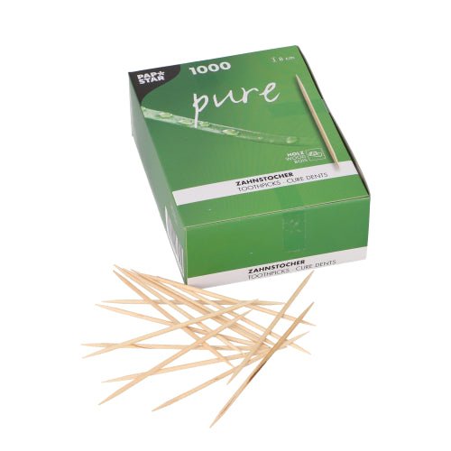 Ένα πράσινο-λευκό κουτί PAPSTAR με την επιγραφή "pure" περιέχει 1000 στρογγυλές ξύλινες οδοντογλυφίδες (8 cm), από τις οποίες μερικές είναι διάσπαρτες στο μπροστινό μέρος. Προϊόν: PAPSTAR οδοντογλυφίδες "pure" από ξύλο, στρογγυλές, 8 cm | κουτί (1000 τεμάχια). Μάρκα: PAPSTAR GmbH.
