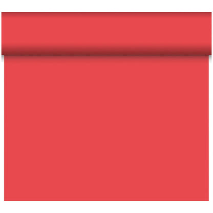 Ein teilausgerollter Dunicel-Tischläufer Tête-à-Tête 24 m x 0,4 m (20 Abschnitte) der Duni GmbH setzt mit seiner glatten Oberfläche und dem gerollten Rand einen stilvollen Akzent in Ihrer Tischdekoration.