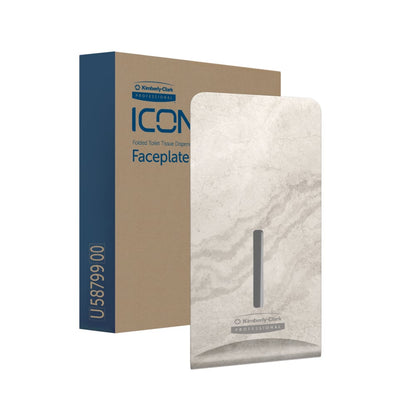 Η Kimberly-Clark Professional™ Icon™ Dispenser Faceplate - FTT (27,80 x 13,10 x 1,40 cm) της Kimberly-Clark GmbH σε μπεζ μάρμαρο απεικονίζεται με τη καφέ και μπλε συσκευασία της και ταιριάζει ιδανικά σε σύγχρονες διακοσμήσεις τουαλέτας.