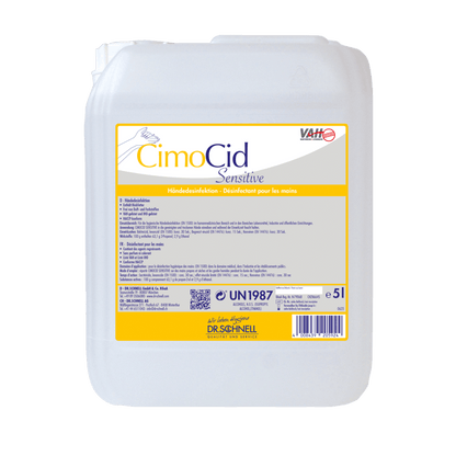 Το λευκό δοχείο 5L από πλαστικό της Dr. Schnell CIMOCID SENSITIVE απολύμανσης χεριών της DR.SCHNELL GmbH & Co. KGaA με κίτρινη ετικέτα προσφέρει απαλό προστασία δέρματος και αποτελεσματική μείωση μικροβίων με πολυγλωσσικές οδηγίες χρήσης και ασφάλειας.
