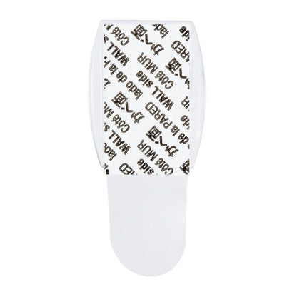 Ένα 3M Command™ Mini-Haken, transparent (17006CLRFGN) von 3M Deutschland GmbH, φαίνεται από πάνω - συμπεριλαμβανομένων διαφανών λωρίδων με εκτύπωση "3M Command" και "WALL", ιδανικό για αποθήκευση χωρίς τρύπημα.