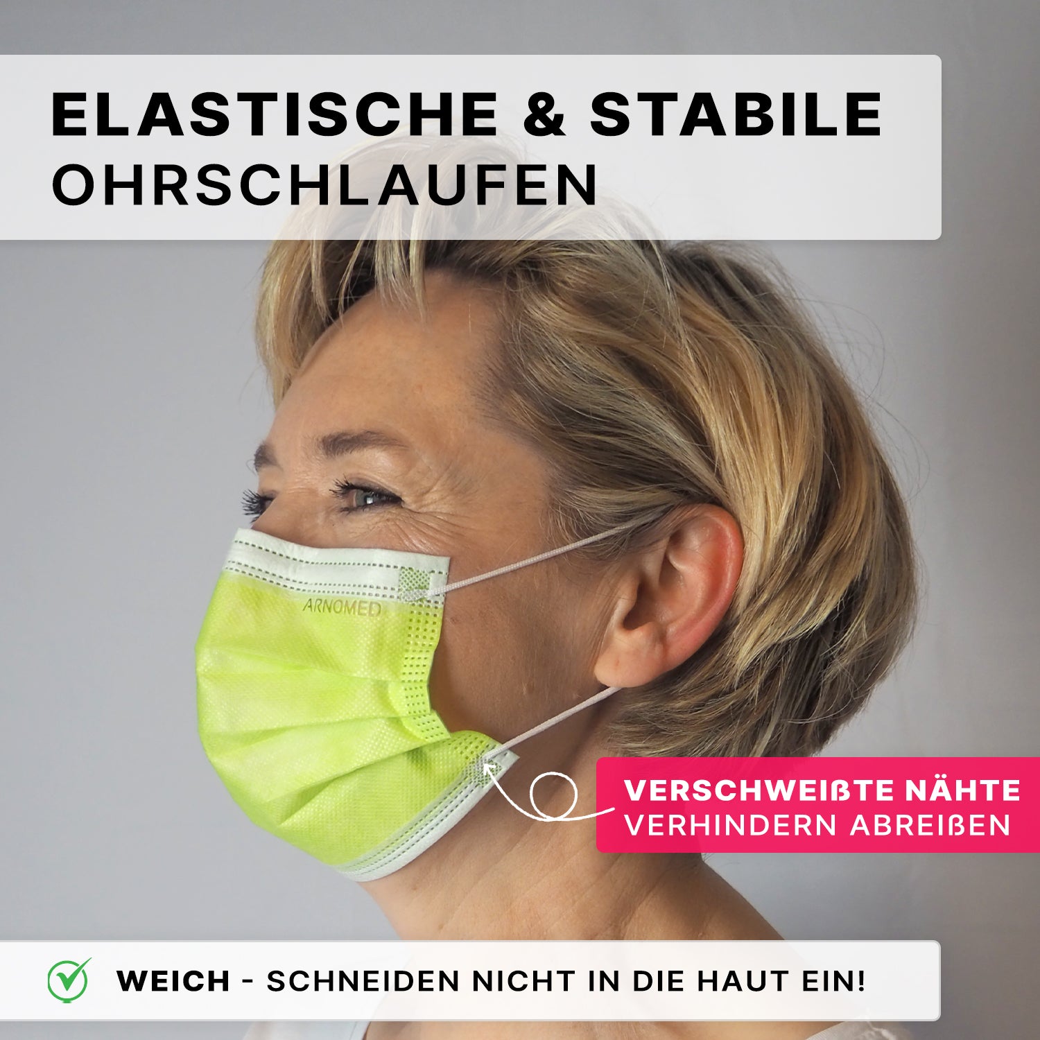 Eine Frau mit kurzen blonden Haaren trägt die ARNOMED MUNDSCHUTZ TYP IIR OP-Mundschutz mit Gummibändern Typ IIR der ARNOWA GmbH, eine hellgrüne Maske mit elastischen und stabilen Ohrschlaufen, versiegelten Nähten gegen Einreißen und einem weichen, hautfreundlichen Design.