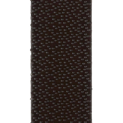 Κοντινή λήψη της σκούρας καφέ, δομημένης επιφάνειας με ανάγλυφα σημεία των 3M Deutschland GmbH Command™ Strips για ανάρτηση εικόνων 17201BLK, μεσαίου μεγέθους, μαύρο, 4 σετ - ιδανικά για ανάρτηση εικόνων χωρίς καρφιά και αφαίρεση χωρίς υπολείμματα.