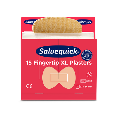 Ένα κόκκινο κουτί Orkla Wound Care AB XL επιθέματα δακτύλων από ύφασμα, 15 κομμάτια/μεταλλείο (συσκευασία 6 κομματιών), με ένα μερικώς αφαιρεμένο επίθεμα. Στη συσκευασία εμφανίζονται το σήμα CE, οι διαστάσεις και μια εικόνα της μορφής του δακτύλου.