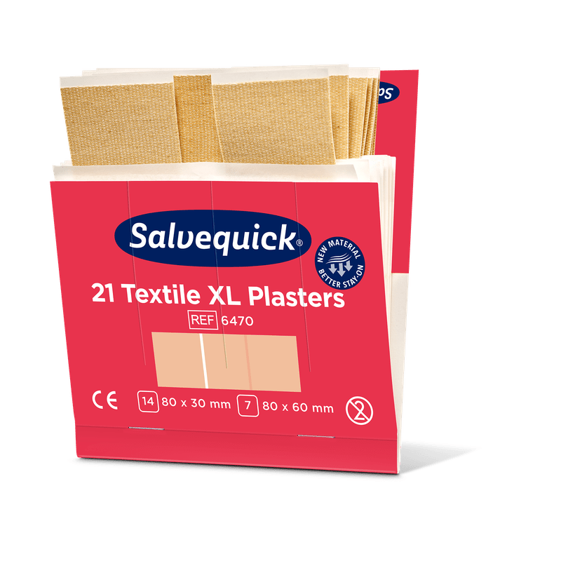 Ένα ροζ-λευκό κουτί από την Orkla Wound Care AB με την επιγραφή "Xl textilgips, 21 κομμάτια/ορυχείο | Πακέτο (6 κομμάτια)" περιέχει μεγάλα υφασμάτινα επιθέματα σε δύο μεγέθη: 80x30 mm και 80x60 mm. Στην κορυφή του ανοιχτού κουτιού φαίνονται αρκετά μπεζ επιθέματα.