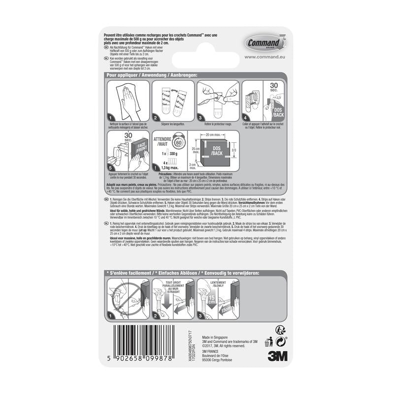 Στην πίσω πλευρά μιας συσκευασίας της 3M Deutschland GmbH Kleine Command™ Strips S, 17022N υπάρχουν εικονογραφημένες, πολυγλωσσικές οδηγίες για την εφαρμογή και αφαίρεση των αυτοκόλλητων λωρίδων χωρίς καρφιά, για να διατηρούνται οι τοίχοι χωρίς ζημιές, καθώς και ένας γραμμωτός κώδικας στο κάτω μέρος.