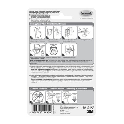 Η πίσω πλευρά μιας συσκευασίας βάσης σκούπας Command™, 17007-FR από την 3M Deutschland GmbH, δείχνει μια εικονογραφημένη, πολυγλωσσική οδηγία για την τοποθέτηση και την αφαίρεση της βάσης με λωρίδες κόλλας Command. Διαγράμματα καθοδηγούν βήμα προς βήμα τη συναρμολόγηση και την αποσυναρμολόγηση.