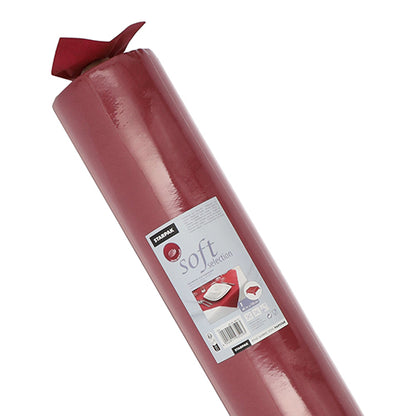 Ένα μεγάλο ρολό τραπεζομάντηλου Starpak, παρόμοιο με ύφασμα Vlies «Soft Selection», είναι εξοπλισμένο με ετικέτα με γραμμωτό κώδικα, το όνομα της μάρκας Starpak και μια εικόνα του χρησιμοποιημένου τραπεζομάντηλου.