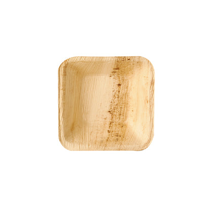 Μια στρογγυλή πιατέλα από φύλλο φοινικιάς από τη σειρά Pure της PAPSTAR GmbH, από ψηλά. Η φιλική προς το περιβάλλον πιατέλα μιας χρήσης είναι μέρος ενός πακέτου των 25 και ιδανική για βιώσιμες εκδηλώσεις. Βρίσκεται σε απλό λευκό φόντο.