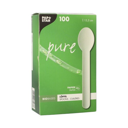 Ένα λευκό κουτί με την επιγραφή "PAPSTAR Pure" περιέχει 100 φιλικά προς το περιβάλλον κουτάλια μιας χρήσης από χαρτί (15,5 cm), όλα βιολογικής βάσης και κατασκευασμένα από την PAPSTAR GmbH. Η μπροστινή πλευρά δείχνει ένα κουτάλι και επισημαίνει το φιλικό προς το περιβάλλον υλικό του χαρτιού.