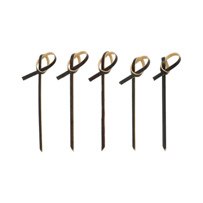 Πέντε PAPSTAR 250 Fingerfood - Picker της PAPSTAR GmbH σε μαύρο με ανοιχτό καφέ διακοσμητικά στοιχεία στην κορυφή, τοποθετημένα σε σειρά σε λευκό φόντο.