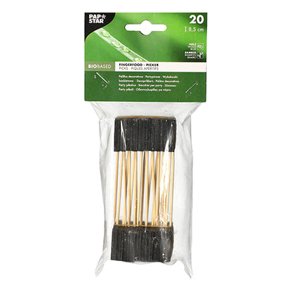 Μια διαφανής πλαστική συσκευασία περιέχει 20 PAPSTAR Fingerfood-Picker, 8,5 cm, μαύρο - ιδανικό για μπουφέδες και πάρτι. Η επάνω ετικέτα δείχνει λεπτομέρειες προϊόντος σε πράσινο φόντο με λευκό κείμενο. Μάρκα: PAPSTAR GmbH.