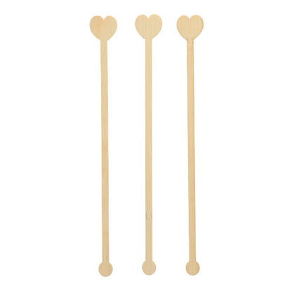 Τρεις PAPSTAR 100 αναδευτήρες ποτών, μπαμπού «pure» της PAPSTAR GmbH είναι τοποθετημένοι κάθετα σε λευκό φόντο, επιδεικνύοντας τις φιλικές προς το περιβάλλον και βιοδιασπώμενες ιδιότητές τους.