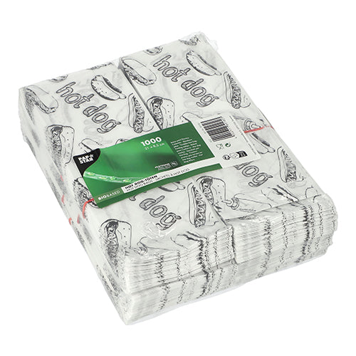 Οι 1000 PAPSTAR σακούλες για χοτ ντογκ (21x8,5 εκ., λευκές) της PAPSTAR GmbH είναι συσκευασμένες και φέρουν μαύρο γραφικό χοτ ντογκ και την επιγραφή "Hot Dog". Έχει τοποθετηθεί μια πράσινη ετικέτα με πληροφορίες προϊόντος.