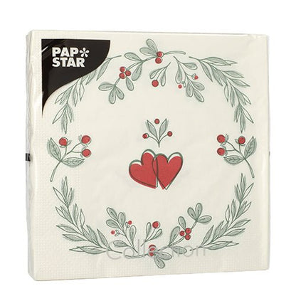 PAPSTAR 20 χαρτοπετσέτες, 33x33 cm, 3-στρώσεων από την PAPSTAR GmbH (Design Set 6) δείχνουν μια λευκή χαρτοπετσέτα με πράσινο στεφάνι φύλλων και κόκκινα μούρα, κόκκινες καρδιές στο κέντρο και μια μαύρη ετικέτα "PAP STAR" πάνω αριστερά.