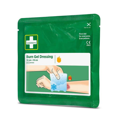 Μια πράσινη συσκευασία Cederroth Verbrennungsgel verband 10x10 cm, 2er-Pack (2 τεμάχια) από την Orkla Wound Care AB δείχνει ένα χέρι που εφαρμόζει το επίθεμα σε έγκαυμα στο χέρι, με σύμβολα φωτιάς και πάγου για πρώτες βοήθειες σε εγκαύματα.