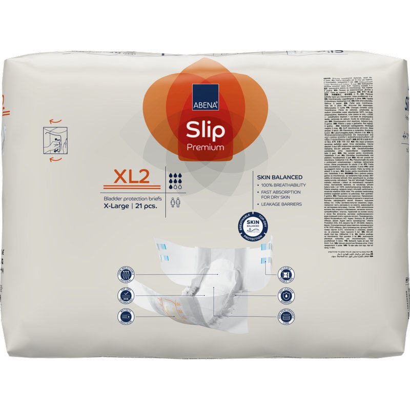 Μια συσκευασία ABENA Slip Premium από την Abena Re-Seller GmbH, μέγεθος XL2, περιέχει 21 τεμάχια σε μπεζ συσκευασία με μπλε και πορτοκαλί τόνους, λεπτομέρειες προϊόντος, ένα χέρι που κρατάει μια πάνα και εικονίδια περίθαλψης ακράτειας.