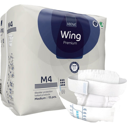 Απεικονίζεται μια συσκευασία ABENA Wing Premium από την Abena Re-Seller GmbH με 15 μεσαίου μεγέθους κομμάτια και ένα ανοιγμένο προϊόν στο μπροστινό μέρος - για βέλτιστη άνεση και προστασία σε ανάγκη κύστης.