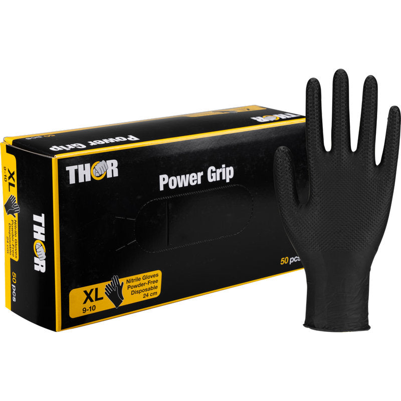 Ένα μαύρο κουτί με την επιγραφή "Thor Power Grip, Schwarz" της Abena Re-Seller GmbH δείχνει XL-γάντια νιτριλίου για προπόνηση δύναμης ή άρση βαρών. Ένα όρθιο γάντι βρίσκεται δίπλα στο κουτί, το οποίο περιέχει 50 γάντια χωρίς πούδρα.
