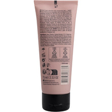 Eine rosafarbene 75-ml-Tube ENA Living Handcreme der Abena Re-Seller GmbH für trockene Hände, abgebildet von der Rückseite mit Produktinformation, Inhaltsstoffen, Barcode, Recycling-Symbolen und Hinweisen in schwarzer Schrift. Auch als Karton erhältlich (18 Packungen).