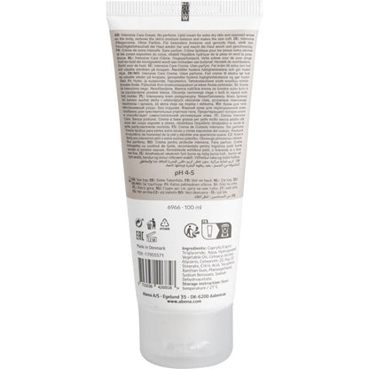 Οπίσθια όψη ενός σωληναρίου 100 ml Abena Re-Seller GmbH Fettcreme για ξηρό δέρμα, κουτί (12 συσκευασίες), με πληροφορίες προϊόντος, οδηγίες χρήσης, λίστα συστατικών, γραμμωτό κώδικα και πληροφορίες κατασκευαστή σε πολλές γλώσσες.