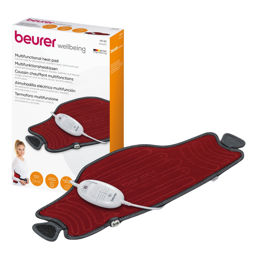Η εικόνα δείχνει ένα Beurer HK 55 θερμαντικό μαξιλάρι Easyfix, ένα πολυλειτουργικό θερμαντικό μαξιλάρι της Beurer GmbH. Το κόκκινο μαξιλάρι με γκρι περίγραμμα έχει έναν συνδεδεμένο ελεγκτή ορατό στο κέντρο. Το προϊόν εμφανίζεται μπροστά από το κουτί συσκευασίας του, το οποίο τονίζει τη λειτουργία γρήγορης θέρμανσης και την καταλληλότητά του για την ανακούφιση της κοιλιάς, της πλάτης και των αρθρώσεων.