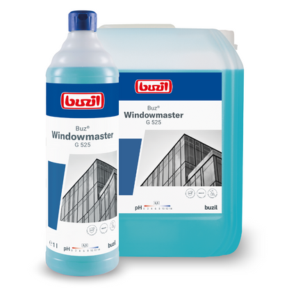 Ένα μπουκάλι και ένας μεγάλος περιέκτης Buzil Buz® Windowmaster G 525 Συμπύκνωμα καθαριστικού γυαλιών και παραθύρων από την BUZIL-WERK Wagner GmbH & Co. KG ξεχωρίζουν για τη γρήγορη ξήρανση της φόρμουλας τους. Οι ετικέτες δείχνουν μια πρόσοψη κτιρίου με παράθυρα και υποδεικνύουν μια τιμή pH 9,5. Και τα δύο είναι γεμάτα με μπλε υγρό που υπόσχεται βελτιωμένο αντιρρυπαντικό αποτέλεσμα.