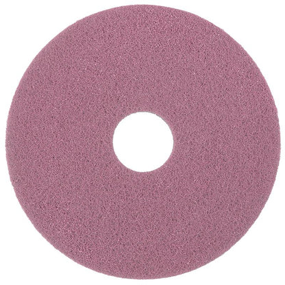 Das Diversey Twister Pad Pink für Vinylböden von Diversey Deutschland GmbH & Co. OHG ist ein rundes, rosafarbenes Reinigungspad mit zentralem Loch und rauer Textur, ideal für harte Reinigungsarbeiten auf Vinylböden mit mikroskopischen Diamanten.
