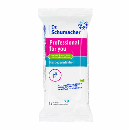 Μια συσκευασία Dr. Schumacher GmbH Professional for you μαντηλάκια απολύμανσης χεριών, με γερμανικό κείμενο σε λευκή συσκευασία και μπλε/ροζ αποχρώσεις. Περιέχει 15 ιοκτόνα, φιλικά προς το δέρμα μαντηλάκια.