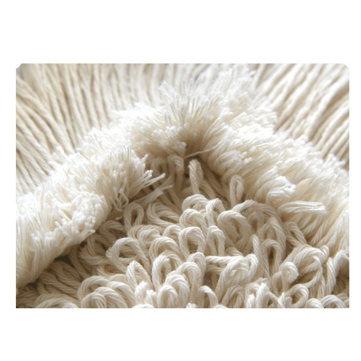 Μια κοντινή λήψη της Arcora First Mopp Blau της Arcora International GmbH δείχνει τις δομημένες, μπλε ίνες της - ιδανικές για την αναβάθμιση των δαπέδων σας και εύκολες στη συντήρηση μέσω τακτικού καθαρισμού.