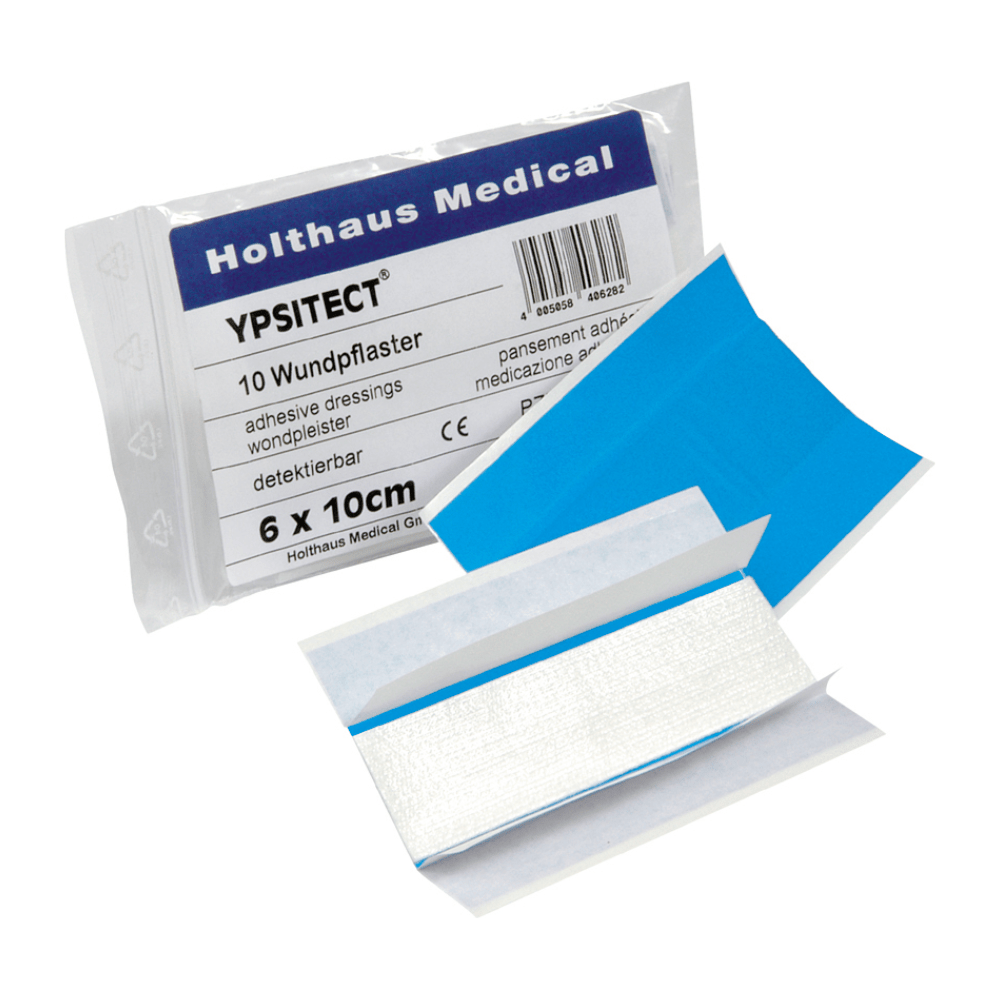 Μια συσκευασία με την επιγραφή «Holthaus Ypsitect® Wundpflaster, αδιάβροχο 6 x 10 cm – 10 τσιρότα | Συσκευασία (1 τεμάχιο)» από την Holthaus Medical GmbH & Co. KG περιέχει αδιάβροχα τσιρότα. Ένα από τα τσιρότα είναι εν μέρει αφαιρεμένο από τη θήκη προστασίας του, έτσι ώστε να είναι ορατή η μπλε πίσω πλευρά του και η κολλώδης επιφάνεια. Η συσκευασία αναφέρει μέγεθος 6 x 10 cm και περιλαμβάνει 10 τεμάχια.