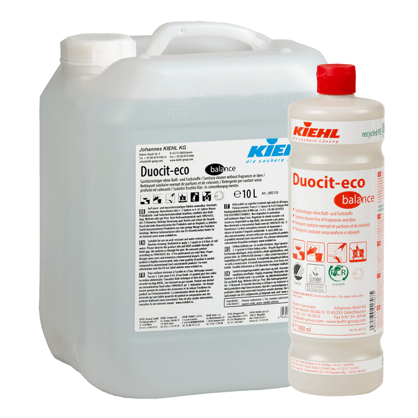 Ένα διαφανές δοχείο 10 λίτρων και ένα λευκό μπουκάλι 1 λίτρου Kiehl Duocit-eco balance καθαριστικό υγιεινής χωρίς αρώματα και χρωστικές της Johannes Kiehl KG, και τα δύο με κόκκινο καπάκι και με οδηγίες χρήσης και ασφάλειας.