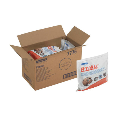 Ένα ανοιχτό κουτί με την επιγραφή "WypAll" της Kimberly-Clark GmbH περιέχει πολλές σφραγισμένες συσκευασίες WypAll® πανάκια - Πράσινο (6 σακούλες x 75 φύλλα). Στην εξωτερική πλευρά μιας συσκευασίας φαίνεται η επωνυμία και εικόνες χεριών που χρησιμοποιούν τα πράσινα πανάκια καθαρισμού.