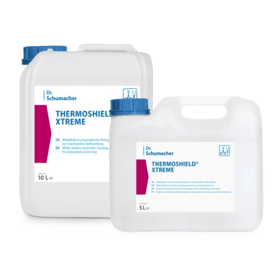 Δύο λευκά πλαστικά δοχεία από την Dr. Schumacher THERMOSHIELD® XTREME από την Dr. Schumacher GmbH, ένα δοχείο 10L και ένα δοχείο 5L, απεικονίζονται δίπλα-δίπλα, με μπλε καπάκια και ετικέτες που περιέχουν το όνομα του προϊόντος και πληροφορίες για την προστασία της επιφάνειας.
