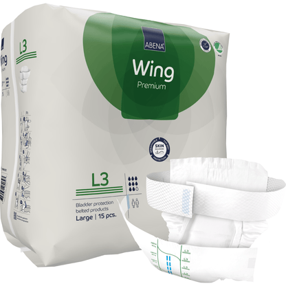 Ένα πακέτο της Abena Re-Seller GmbH ABENA Wing Premium παρουσιάζεται με 15 μεγάλα προϊόντα ακράτειας με ζώνη σε πράσινο και λευκό χρώμα. Ένα ανοιγμένο προϊόν είναι απεικονισμένο μπροστά και τονίζει τόσο την προστασία όσο και την άνεση.