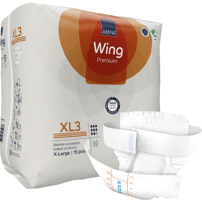 Απεικονίζεται ένα πακέτο ABENA Wing Premium της Abena Re-Seller GmbH, χαρακτηρισμένο για προστασία της κύστης και υγεία του δέρματος, με μια ξεδιπλωμένη πάνα μεγέθους X-Large στο προσκήνιο. Το πακέτο περιέχει 15 τεμάχια για προστασία και άνεση.