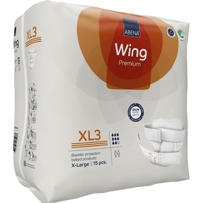 Ένα πακέτο της Abena Re-Seller GmbH ABENA Wing Premium XL3 προϊόντα ακράτειας (X-Large, 15 τεμάχια) προσφέρει προστασία και άνεση σε μια κυρίως λευκή συσκευασία με πορτοκαλί τόνους και σαφείς πληροφορίες προϊόντος.