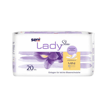 Μια συσκευασία των 20 Seni Lady Slim Mini a20 από την TZMO Deutschland GmbH με σχέδιο βιολετί ίριδας και γερμανικό κείμενο προσφέρει ελαφριά προστασία από την αδυναμία κύστης με το σύστημα Extra Dry για αναπνευσιμότητα και απορροφητικότητα.