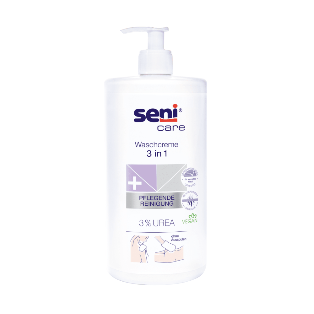 Ένα λευκό μπουκάλι με αντλία της TZMO Deutschland GmbH Seni Care Waschcreme 3 σε 1 με 3% ουρία, 1000 ml, με την επιγραφή vegan. Το γερμανικό κείμενο τονίζει τον απαλό, περιποιητικό καθαρισμό - ιδανικό για τις ανάγκες του ευαίσθητου δέρματος.