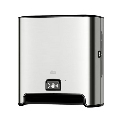 Ένας αισθητήρας TORK Tork Matic® 460001 για πετσέτες ρολού Image Line από ανοξείδωτο ατσάλι για τοποθέτηση στον τοίχο με αισθητήρα H1 | Συσκευασία (1 τεμάχιο) με μαύρη βάση και σύμβολο ένδειξης αισθητήρα στην μπροστινή πλευρά. Αυτός ο διανομέας, που έχει σχεδιαστεί για ανέπαφη διανομή μονών φύλλων, διαθέτει μια σύγχρονη, απλή εμφάνιση και χρησιμοποιεί πετσέτες ρολού για να εξασφαλίσει μια υγιεινή εμπειρία.