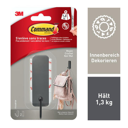 Ένα πακέτο της 3M Deutschland GmbH με 1 μεσαίου μεγέθους Command™ μαύρο ματ γάντζο (17034B) και 2 λωρίδες· αντέχει έως και 1,3 κιλά, δεν απαιτείται τρύπημα. Περιλαμβάνει μαύρο γάντζο τοίχου, κολλητική ταινία και μια εικόνα παραδείγματος· πληροφορίες στα γαλλικά και γερμανικά.