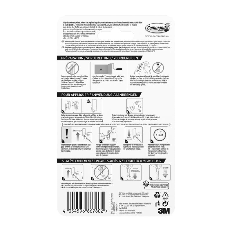 Η πίσω πλευρά του μικρού Command™ μεταλλικού γάντζου σε βουρτσισμένο νικέλιο, 17033, 1 γάντζος, 2 λωρίδες από την 3M Deutschland GmbH δείχνει πολυγλωσσικές εικονογραφικές οδηγίες για την τοποθέτηση και την αφαίρεση καθώς και πληροφορίες για ισχυρή συγκράτηση και κομψό φινίρισμα.