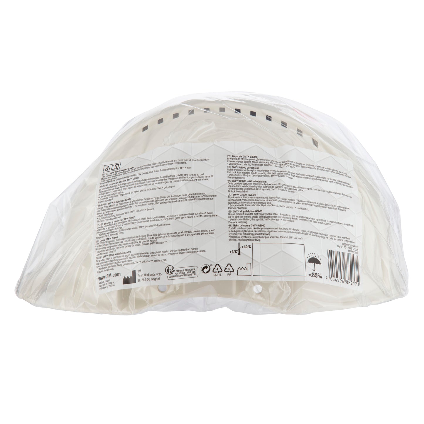Der 3M™ Schutzhelm G3000C Uvicator von 3M Deutschland GmbH ist ein weißer Bauhelm, sicher verpackt in klarem Kunststoff mit einem detaillierten Etikett auf der Rückseite - ideal für zuverlässigen Arbeitsschutz.