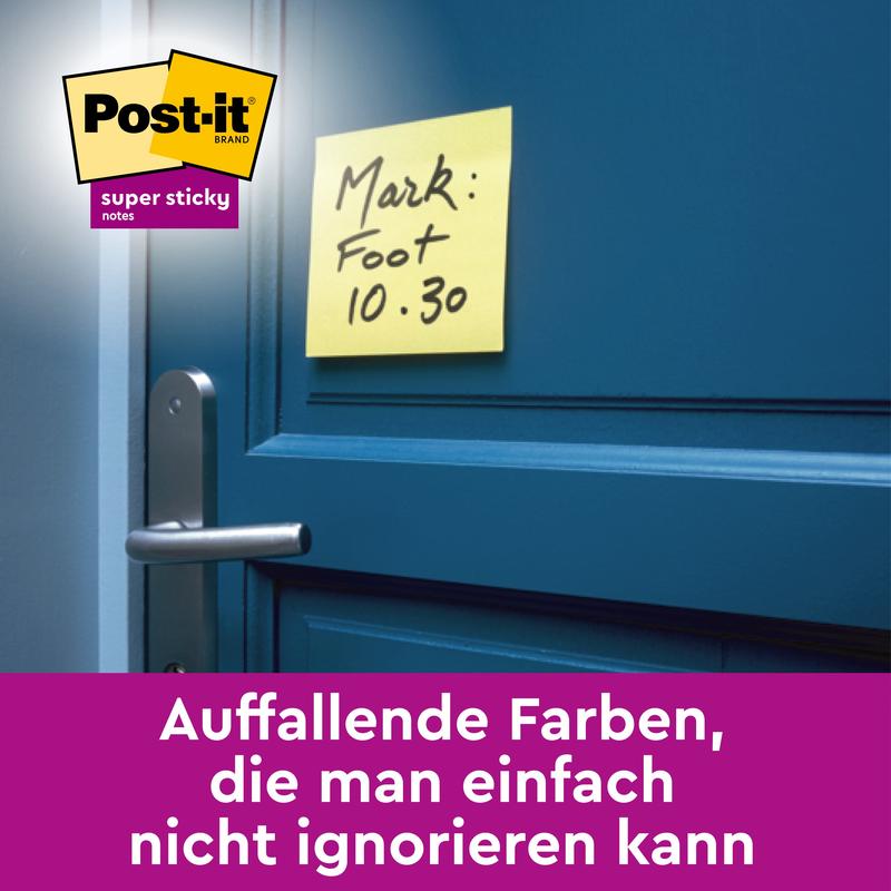 Ένα Post-it® Super Sticky Note σε κίτρινο (76 mm x 127 mm) από την 3M Deutschland GmbH είναι τοποθετημένο πάνω από μια μπλε πόρτα και δείχνει χειρόγραφο και γερμανικό κείμενο. Η εικόνα δείχνει επίσης πολύχρωμα σημειωματάρια και τονίζει το branding των Post-it.